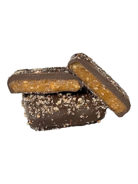 A 7oz box of GRIFF'S TOFFEE - PECAN TOFFEE by GRIFFS TOFFEE, gluten free, shown with chocolate-covered toffee and chopped pecans. Net weight: 7oz (198g).