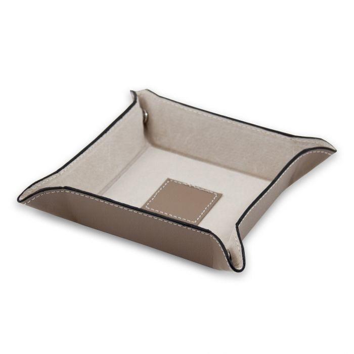 The LEATHER VALET IN TAUPE by BEYBERK INTERNATIONAL features taupe leather, black trim, raised edges, a stitched center patch, and pigskin leather lining. Elegantly displayed against a white background.