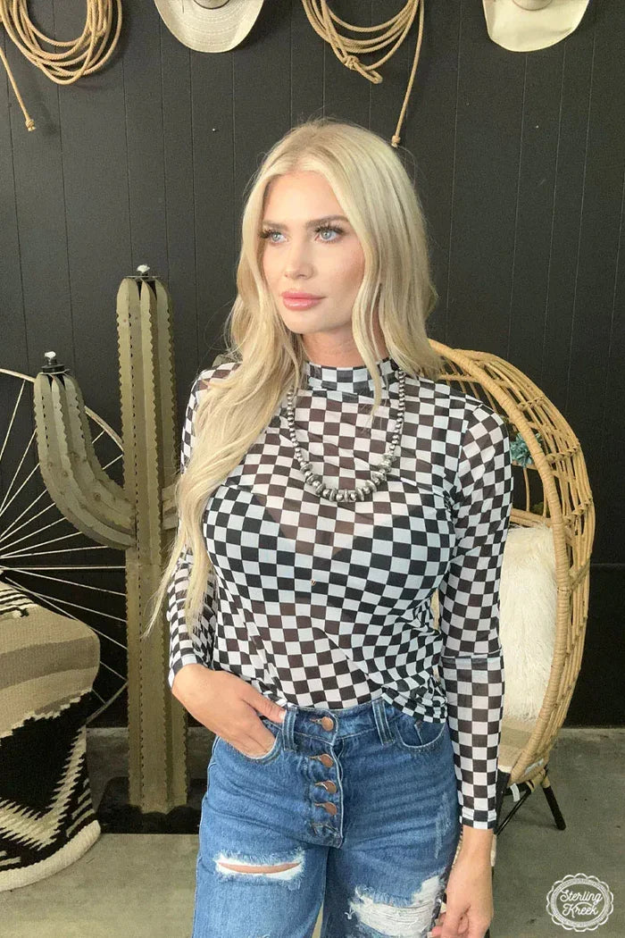 Woman in checkered top
