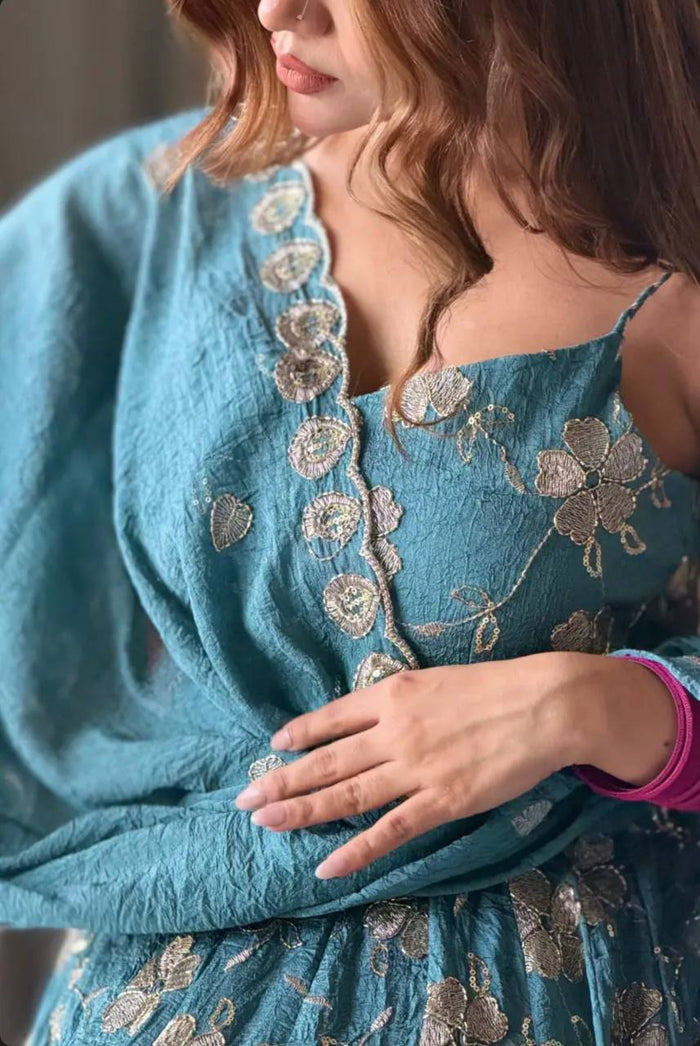 Teal embroidered fancy silk Anarkali suit