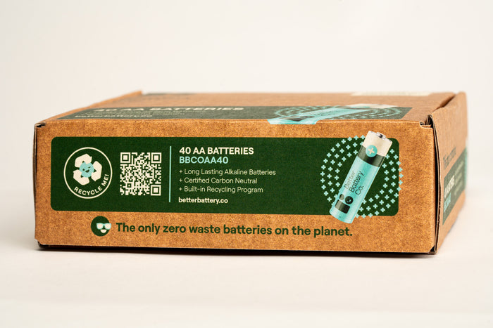 The 40 AA Alkaline Batteries from Better Battery Co features a green design with recycling symbols, highlighting Zero Waste technology, carbon-neutral alkaline production, and a built-in recycling program. A QR code and the URL betterbattery.co are prominently displayed.