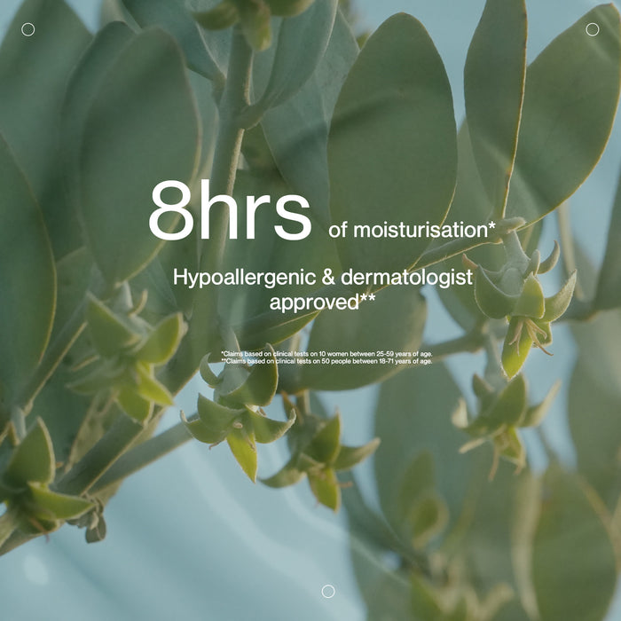 Green leaves with text about moisturization and approval on a light blue background