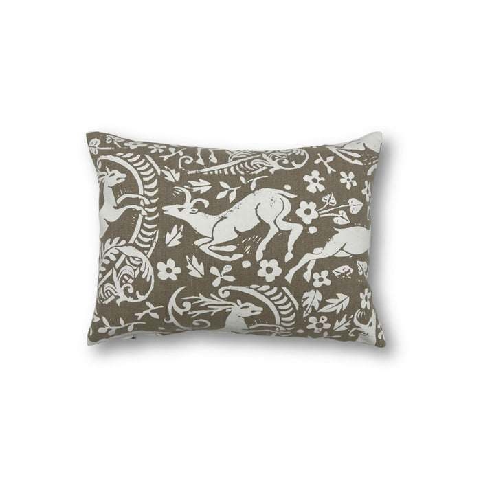Rectangular throw pillow with a white ram and botanical printed pattern on a natural linen background.
