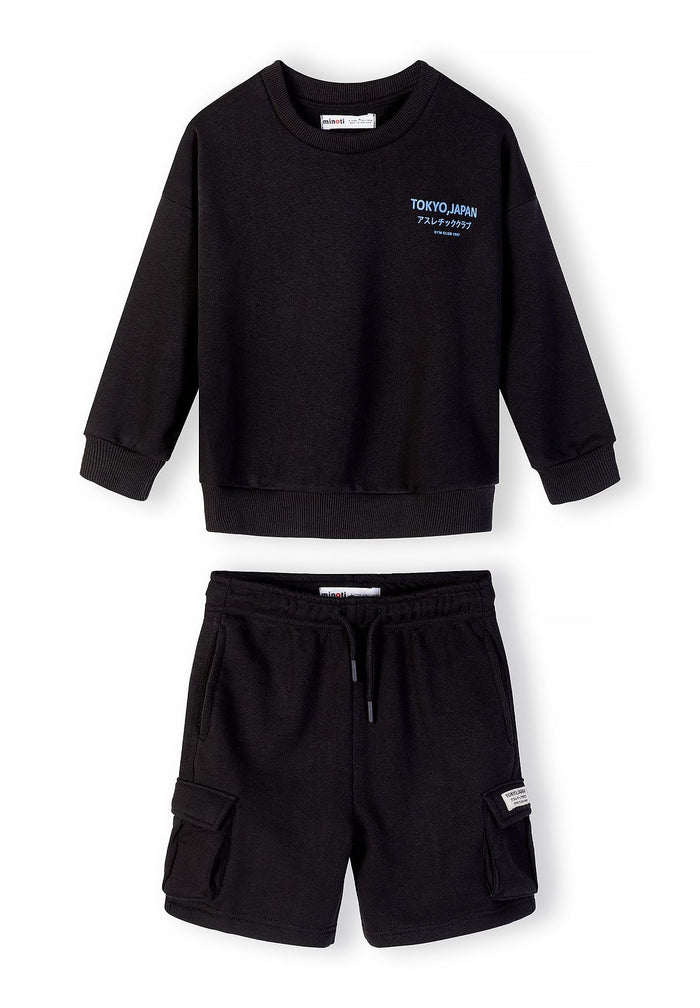 Boys black sweatshirt with crew neck and cargo shorts with side pockets, front view.