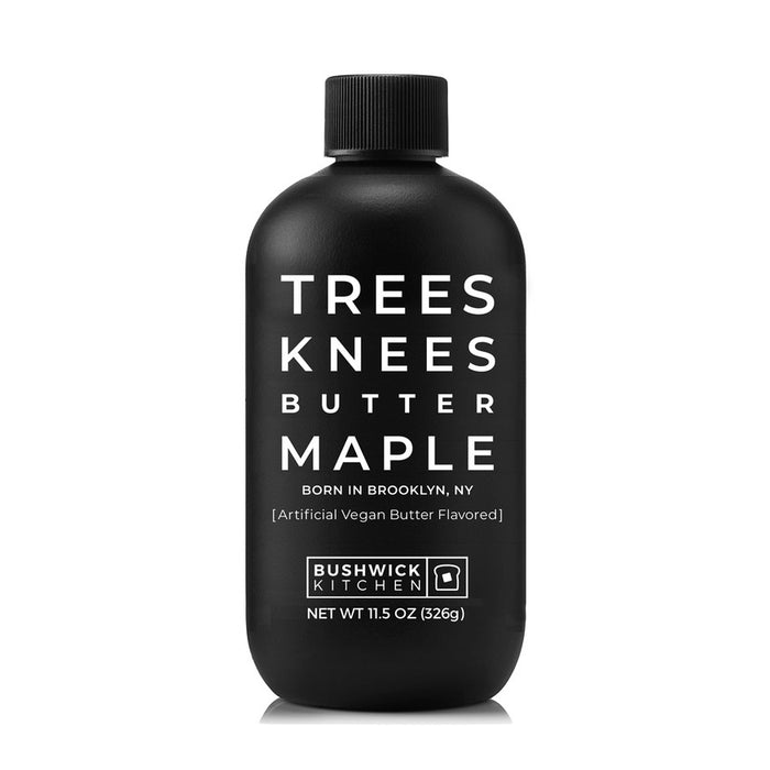 A black bottle labeled "Bushwick Kitchen - Trees Knees Butter Maple Syrup" features white text, "Born in Brooklyn, NY," vegan butter flavor highlights, and displays "Net Wt 11.5 oz (326g).