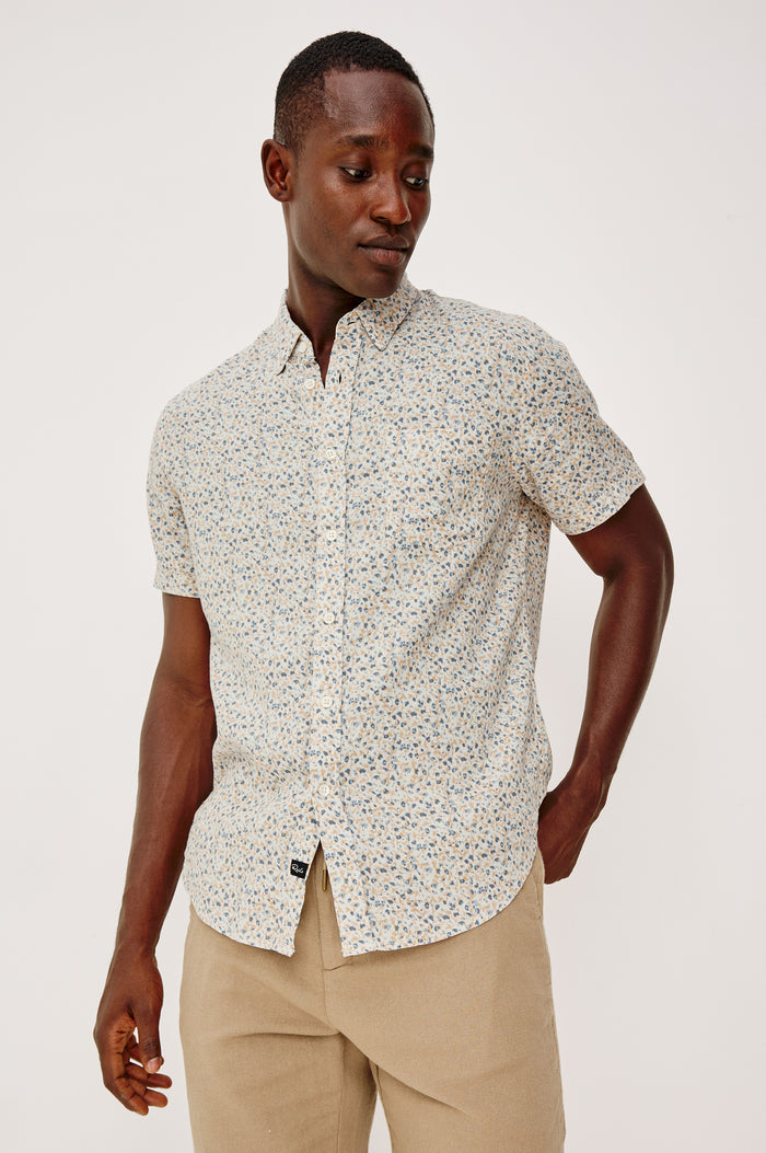Carson Button Front Shirt in Linen Blend With Collar, Short Sleeves, Chest Patch Pocket, and Classic Fit in Spring Blossom Parchment Colorway - Upper Body Front View Featured on Model