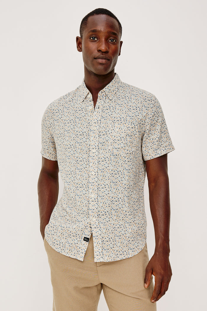 Carson Button Front Shirt in Linen Blend With Collar, Short Sleeves, Chest Patch Pocket, and Classic Fit in Spring Blossom Parchment Colorway - Upper Body Front View Featured on Model