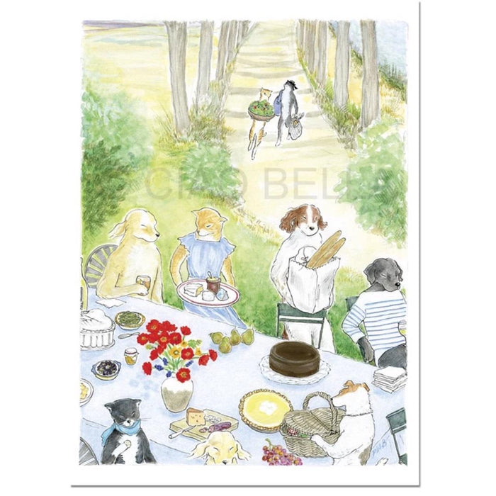 A group of animals and a person gather outdoors around food, cakes, flowers, and the CIAO BELLA - LE MIDI CARD by CIAO BELLA. Two animals carrying groceries approach the picnic along a tree-lined path.