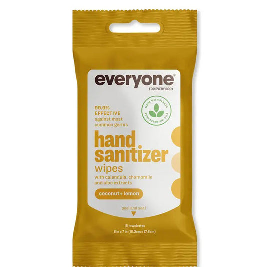 A yellow and white package of EVERYONE FOR EVERYBODY COCONUT & LEMON HAND SANITIZER WIPES with calendula, chamomile, and aloe extracts. These resealable wipes kill 99.9% of germs and contain 15 towelettes.