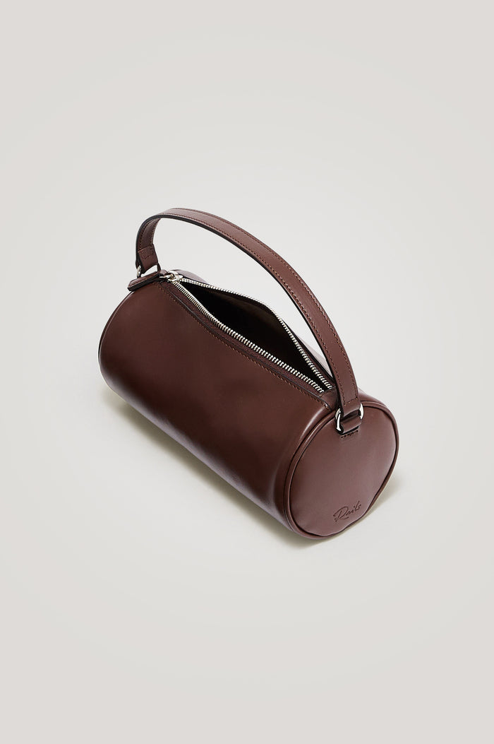 Como Mini Barrel Bag in Italian Leather With Fixed Top Strap, Removable and Adjustable Buckled Crossbody Strap, Top Zipper, Side-Embossed Logo, Branded Interior Label in Espresso Colorway - Top View Featured