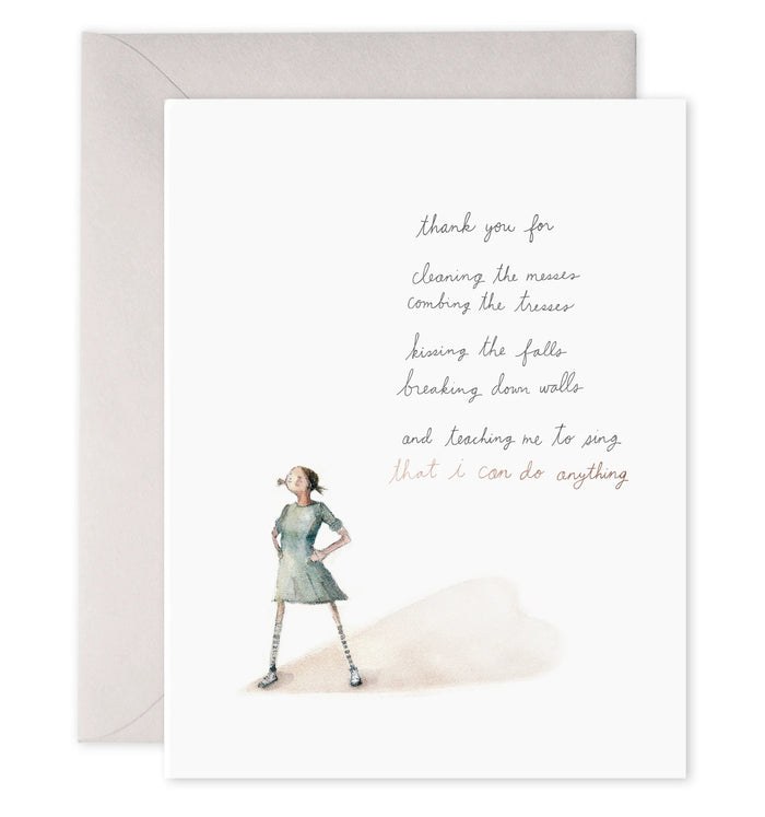 The E. FRANCES PAPER - SUPERGIRL CARD showcases an original watercolor of a girl in a green dress with striped socks, exuding confidence. The card conveys gratitude for support and encouragement, printed on luxe heavyweight paper, and includes an envelope.