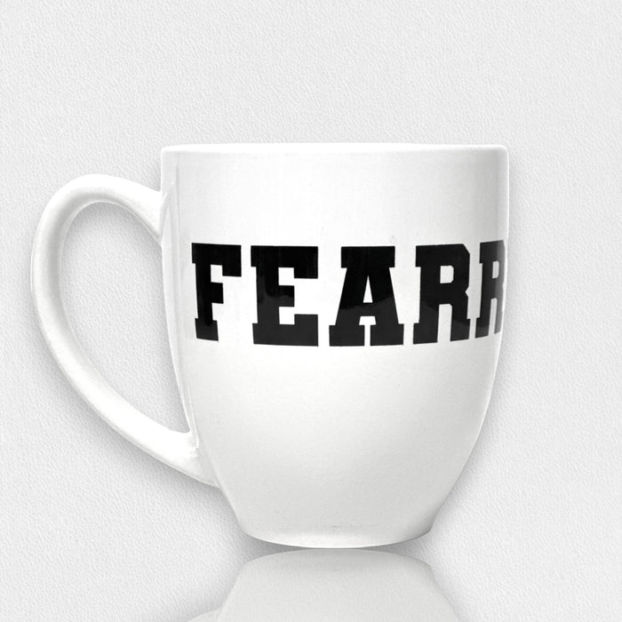 The STRAN FEARRINGTON LIFESTYLE COLLECTION - FEARRINGTON MUG is a white ceramic 16 oz mug featuring bold black “FEARR” text on the front, shown against a plain white background.