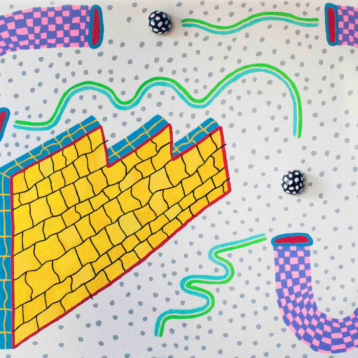 The artwork 'Flowin' through Tubes in an Infinite Loop' by Ryan Patrick Martin features vibrant yellow geometric structures with blue outlines, connected by flowing neon green tubes. Pink and blue checkered cylindrical forms accent the composition, while scattered grey dots create a textured background. Epoxy clay and acrylic create dynamic dimensional effects.