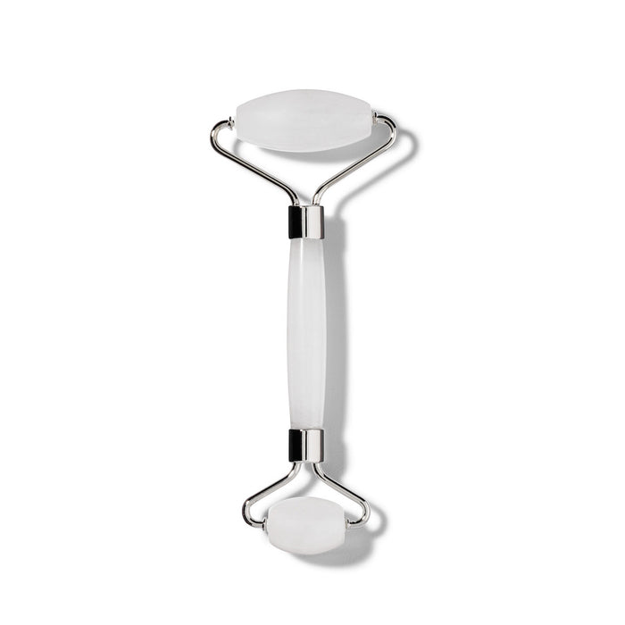 The Terra Beauty Bars Frosted Quartz Facial Roller features dual-sized rollers on each end with a smooth connecting handle, mounted on metal brackets. Its expertly crafted for facial massage and skin depuffing against a minimalist plain white background.