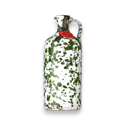 The GALLANTINO - EXTRA VIRGIN OLIVE OIL by ZIA PIA IMPORTS features a white ceramic bottle with green splatters, a looped handle, red wax seal near the neck, and green label, evoking classic Italian tradition against a plain white background.