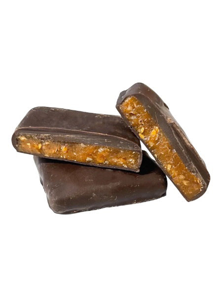 A 7oz box of GRIFF'S TOFFEE - COFFEE by GRIFFS TOFFEE, labeled gluten free, features rich dark chocolate and pecan toffee. The packaging shows tempting stacks of chocolate-coated coffee toffee pieces.