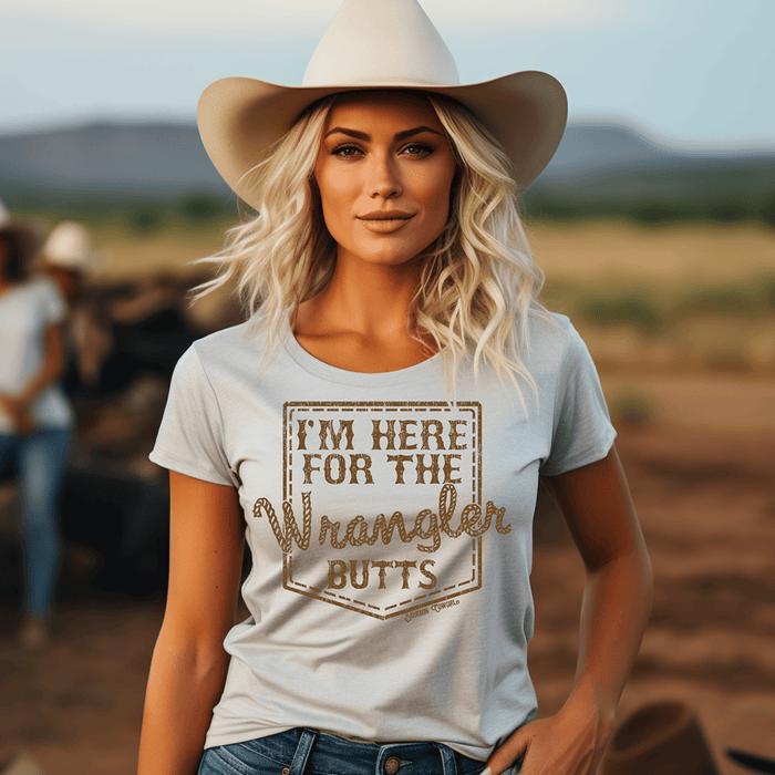 Woman in Wrangler Butts cream shirt