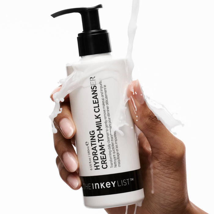 Model holding Hydrating Cream-to-Milk Cleanser