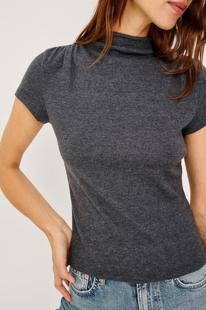 Isobel Top in Brushed Rib Jersey With Funnel Neckline, Shirred Shoulders, and Short Sleeves in Charcoal Colorway - Upper Body Close Up Front View Featured on Model