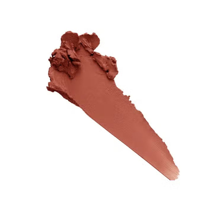 A burgundy JASON WU BEAUTY HOT FLUFF LIP/EYE/CHEEK matte lipstick stands upright with the brand name printed vertically, set against a pale pink background.