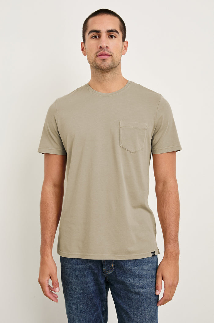 Johnny cotton jersey t-shirt with front chest pocket in Desert Sand - front view on model