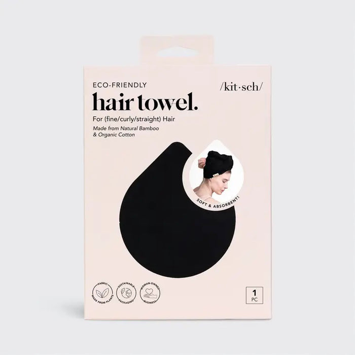 The KITSCH Quick Dry Hair Towel packaging highlights its luxurious eco-friendly blend of organic cotton and bamboo, showcasing softness and high absorbency. An image emphasizes friction-free drying, with the towel elegantly displayed beside the box, reflecting its natural allure.