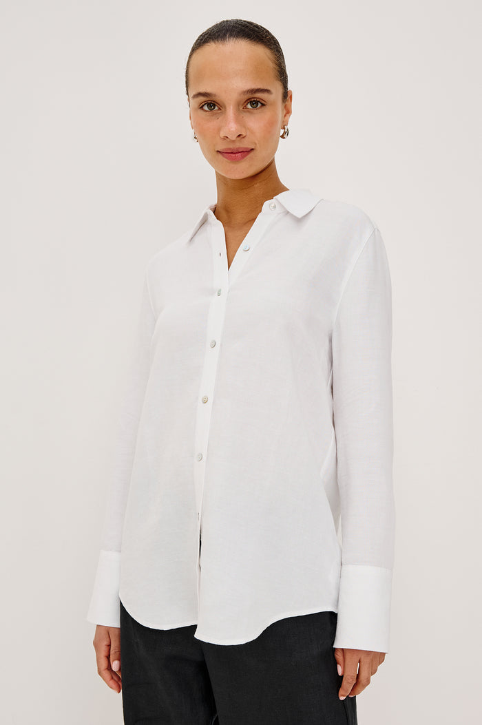 Knox Button-Up Shirt in Linen Viscose With Collar, Front Buttons, Long Sleeves, and Relaxed Fit in White Colorway - Upper Body Front View Featured on Model