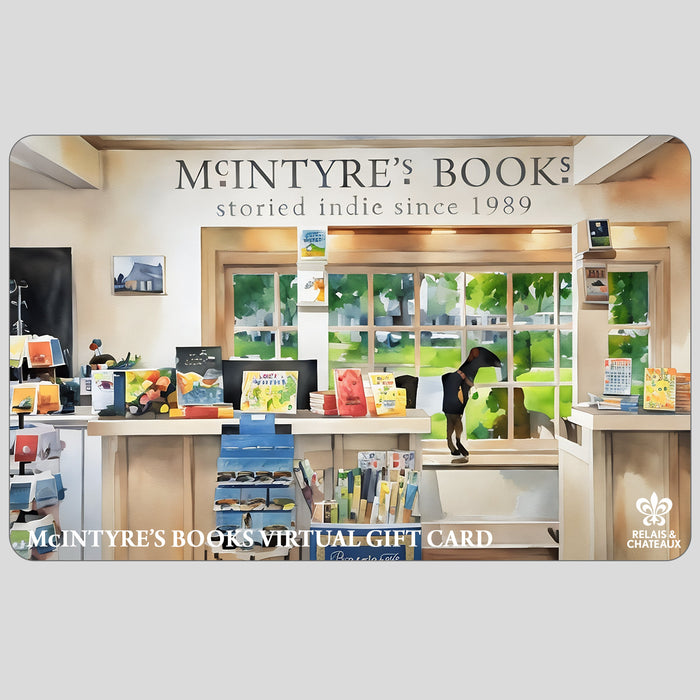 A bright, spacious bookstore with wooden floors, shelves of books and cards, and a sign reading "MCINTYRE'S BOOKS VIRTUAL E-GIFT CARD"—the perfect last minute gift from FEARRINGTON VILLAGE. The Relais & Châteaux logo is in the corner.