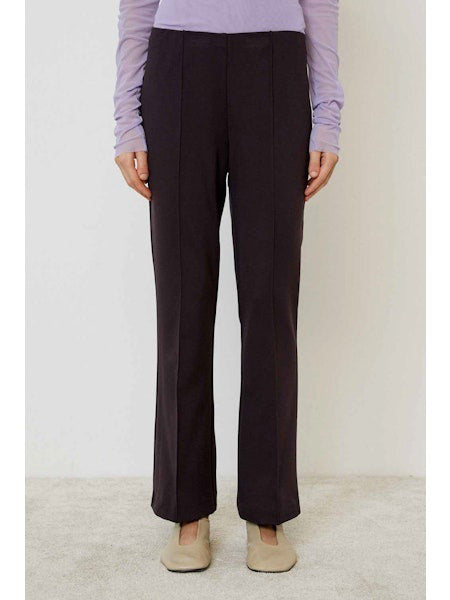A close-up of MEIMEIJ's plain, dark brown fabric with a smooth, even texture—ideal for MEIMEIJ - PULL ON PANTS.