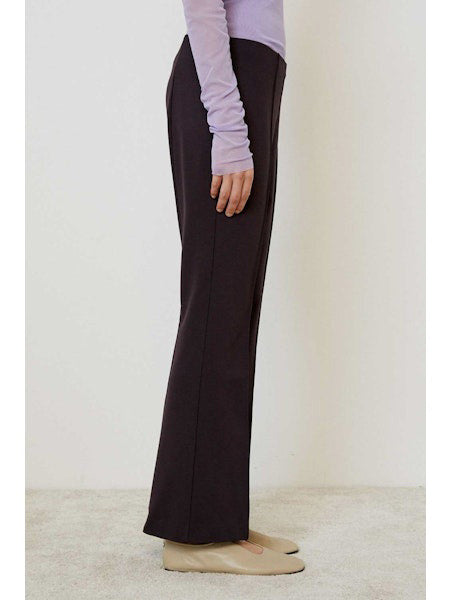 A close-up of MEIMEIJ's plain, dark brown fabric with a smooth, even texture—ideal for MEIMEIJ - PULL ON PANTS.