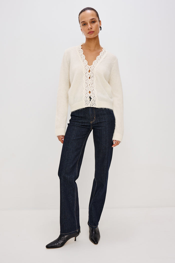 Mer Relaxed Fit Knit Cardigan in Soft Alpaca-Wool Brand With a V-Neckline, Lace Trim, Front Button Closures, and Long Sleeves in Ivory Colorway - Fulled Body Front View Featured on Model