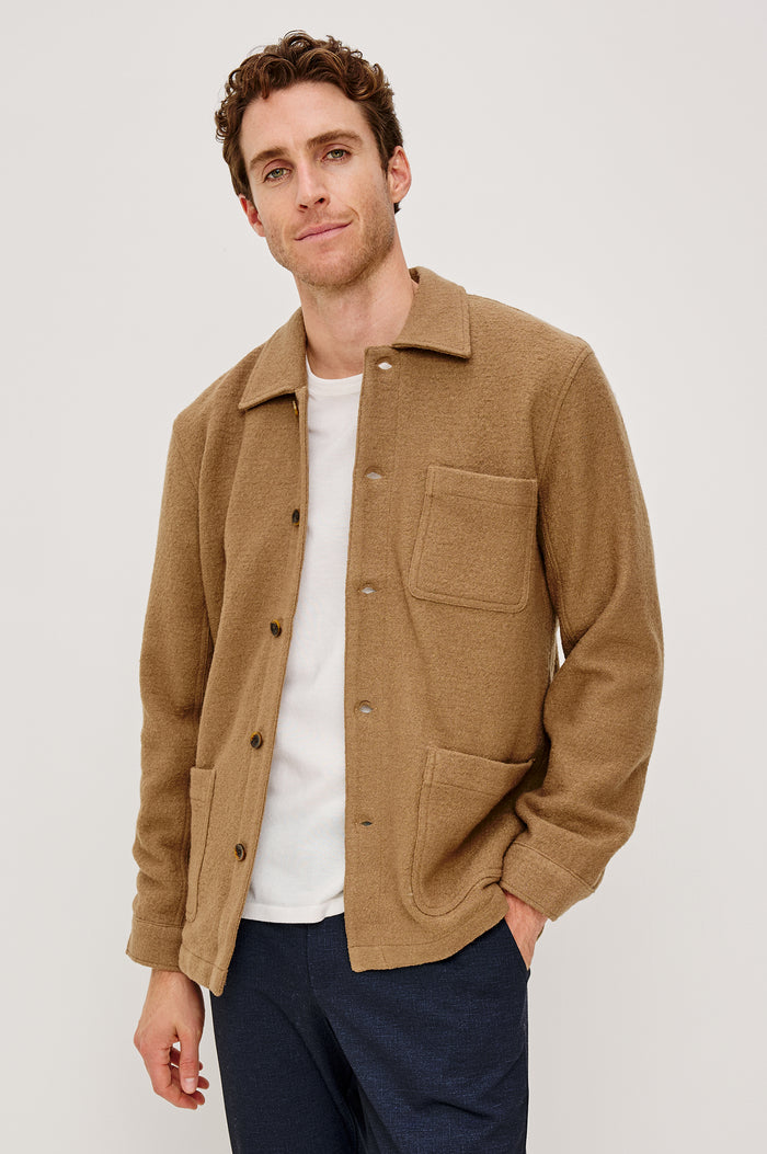 Pascal Jacket With Collar, Front Buttons, Front Patch Pockets, and a Single Chest Pocket in Light Brown Boucle Colorway - Upper Body Front Close Up View Featured on Model
