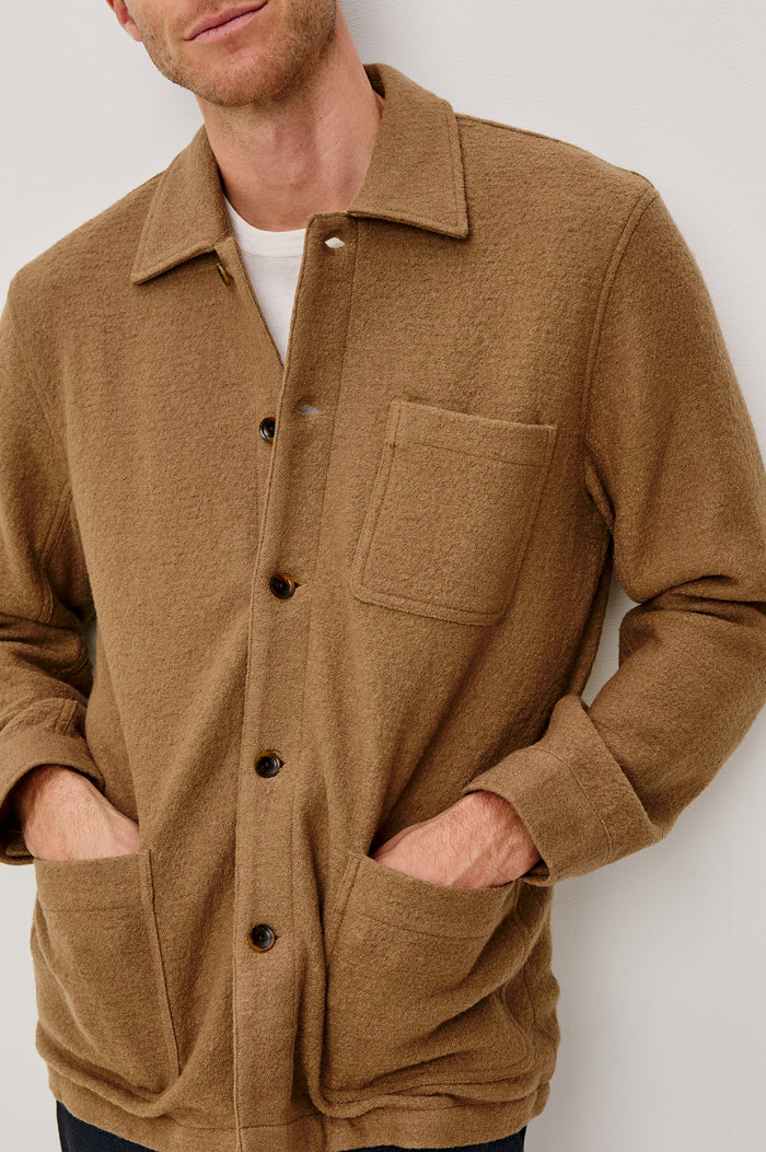 Pascal Jacket With Collar, Front Buttons, Front Patch Pockets, and a Single Chest Pocket in Light Brown Boucle Colorway - Upper Body Front Close Up View Featured on Model