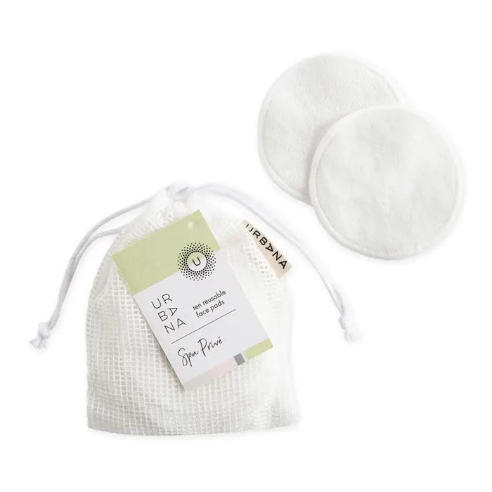 A set of REUSABLE FACE PADS from EUROPEAN SOAPS, LLC, perfect for your skin care routine. The image shows two white, round face pads and a white drawstring mesh bag with a tag that reads "REUSABLE FACE PADS, Spa Prive." An ideal travel companion for staying refreshed on the go.