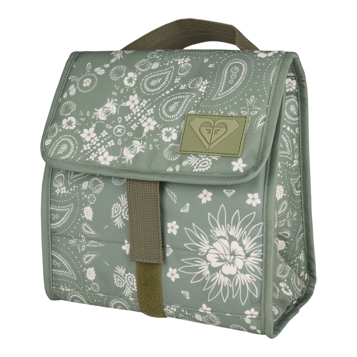 Introducing the Smiling Seagulls Lunch Bag by Roxy: a charming green insulated lunch bag adorned with a playful white floral and paisley print. It features a sturdy brown fabric handle, secure Velcro closure, and a stitched Roxy logo patch on the front flap. The boxy silhouette and structured sides enhance both its style and functionality.
