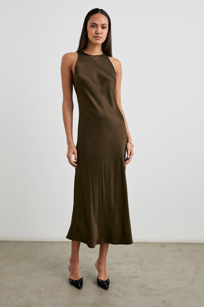 Solene Sleeveless Midi Dress with a Crew Neck and a Tie Keyhole at the Back in Dark Moss Colorway - Front Full Body View Featured on Model