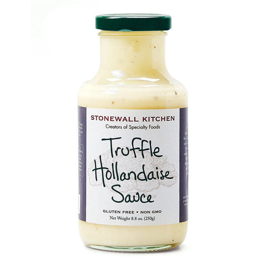 Indulge in a luxurious eggs Benedict with STONEWALL KITCHEN- TRUFFLE HOLLANDAISE Sauce. This gluten-free and non-GMO product boasts a net weight of 8.8 oz (250g). The jar is adorned with a green lid against a white background, exuding the rich aroma of black truffles.