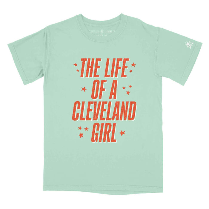 Mint green t-shirt with red text 'The Life of a Cleveland Girl' on a white background