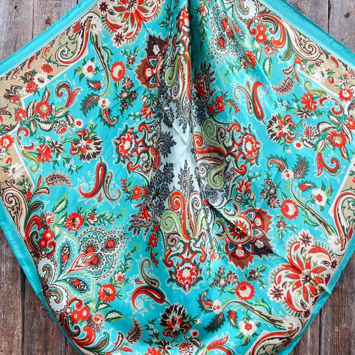 Turquoise floral scarf with paisley pattern