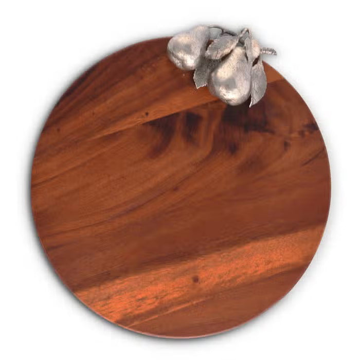 The VAGABOND HOUSE PEAR CHEESE TRAY is a round wooden serving board featuring a pure-pewter pear and leaf cluster for a unique, elegant touch.